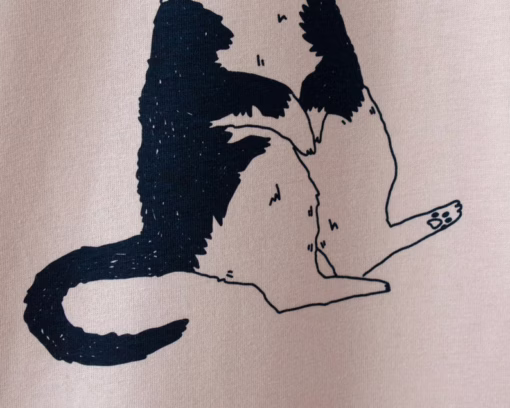 Orange Cat t-shirt | Hand screen printed illustration of a cat balancing oranges on misty pink organic cotton tee with navy and orange