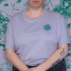 Summer Bouquet T-Shirt | Hand screen printed illustration of 7 cats with flowercrowns and other plants in green on lilac organic cotton tee